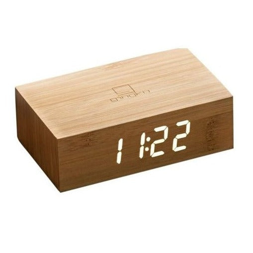 Gingko Flip clock in bamboo displaying the time in white