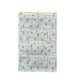 Peter Rabbit Nursery Organiser. Featuring 12 individual pockets over 4 shelves, rope to hang the organiser on the wall. The colours are light grey with a pastel polka dot and peter rabbits repeated across  the fabric
