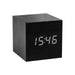 Gingko Cube LED Click Clock in a black wooden effect displaying the time in white