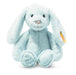 A baby blue coloured bunny rabbit called hoppie with a yellow Steiff tag in the ear and 'my first Steiff' embroidered on the foot   