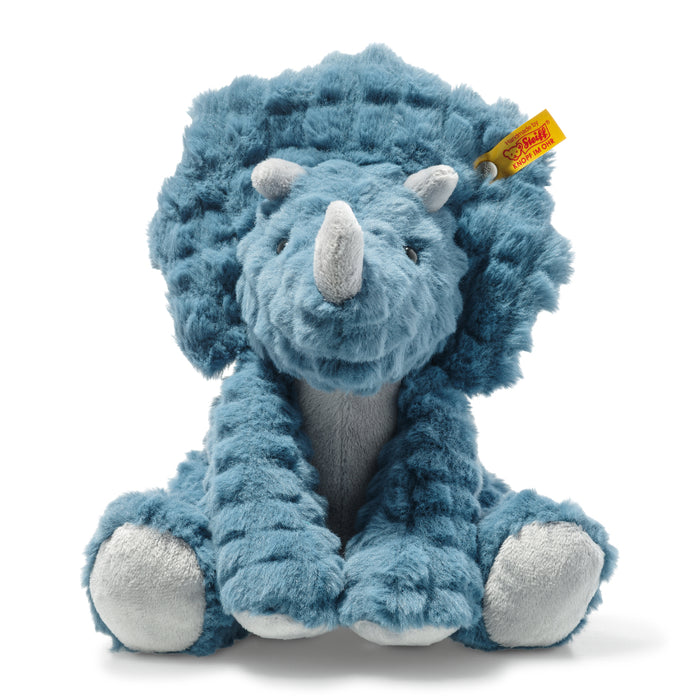 Blue plush dinosaur toy with white feet on a white background