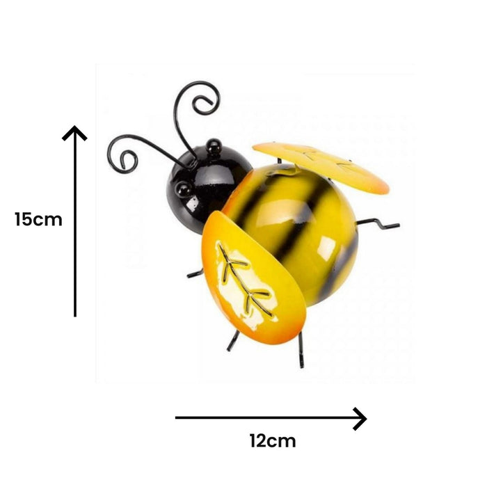 Yellow and black bee-shaped object with dimensions on a white background