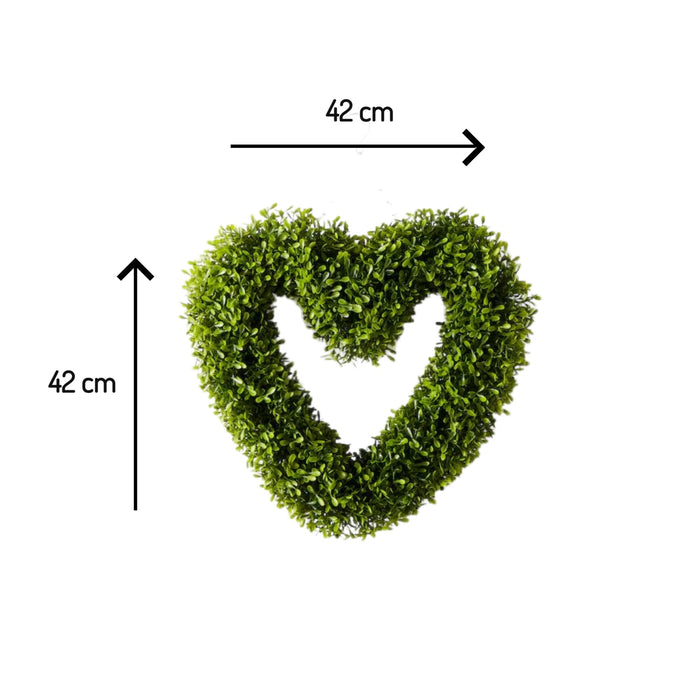 Heart-shaped green wreath with measurements on a white background