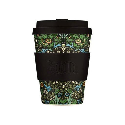 Reusable coffee cup with floral pattern and black lid on a white background