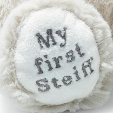 A image of 'My first steiff' embroidered on the foot 