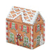 Gingerbread house-shaped box with festive design on a white background