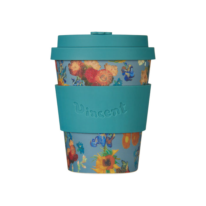 Reusable cup with floral design and teal lid on a white background