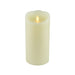 White LED candle with a lit flame on a white background