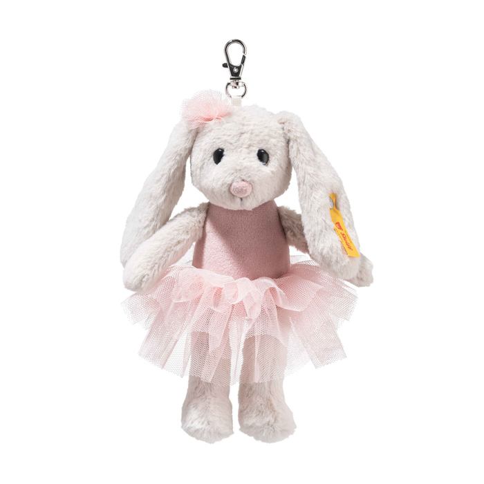 Plush bunny keychain with a pink dress on a white background
