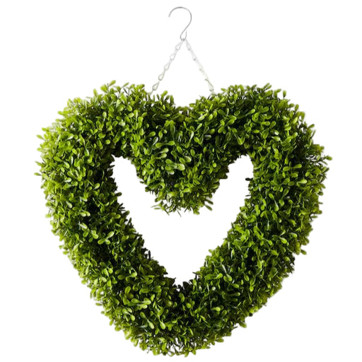 Heart-shaped green wreath on a white background