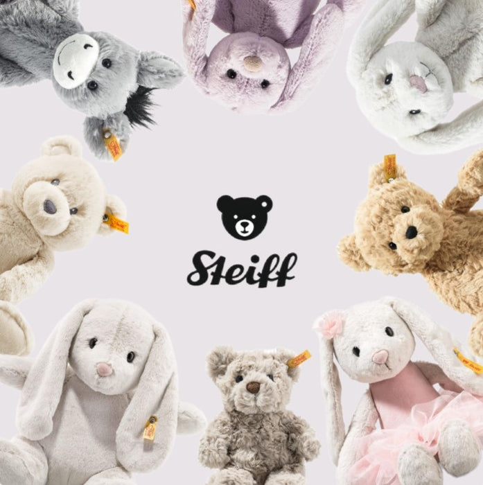 Collection of Steiff plush toys on a light background with the Steiff logo.