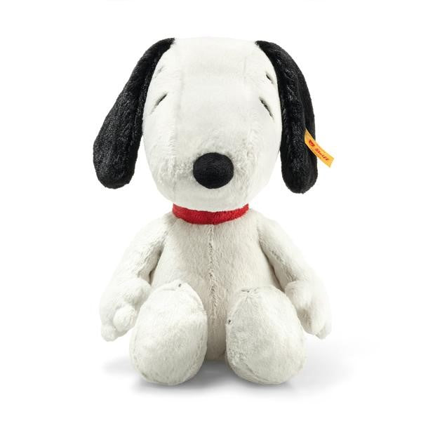 Plush dog toy with a red collar on a white background