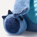 Close-up of a blue plush toy with black accents on a white background