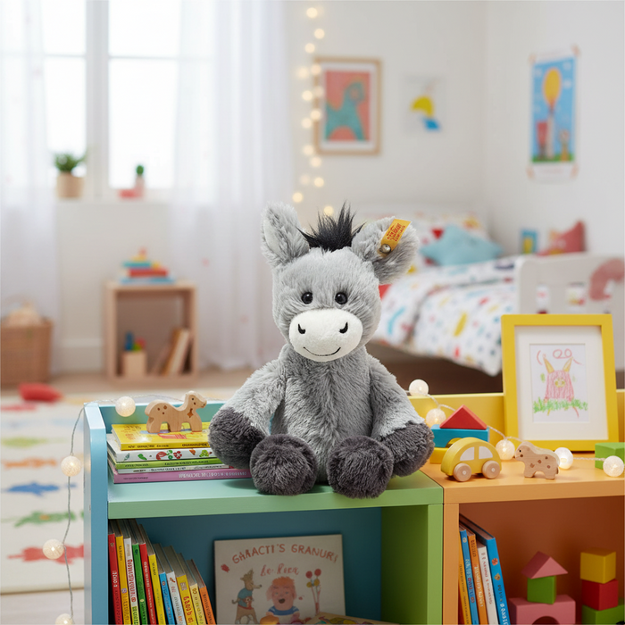 Plush donkey toy on a children's bookshelf with toys and books around