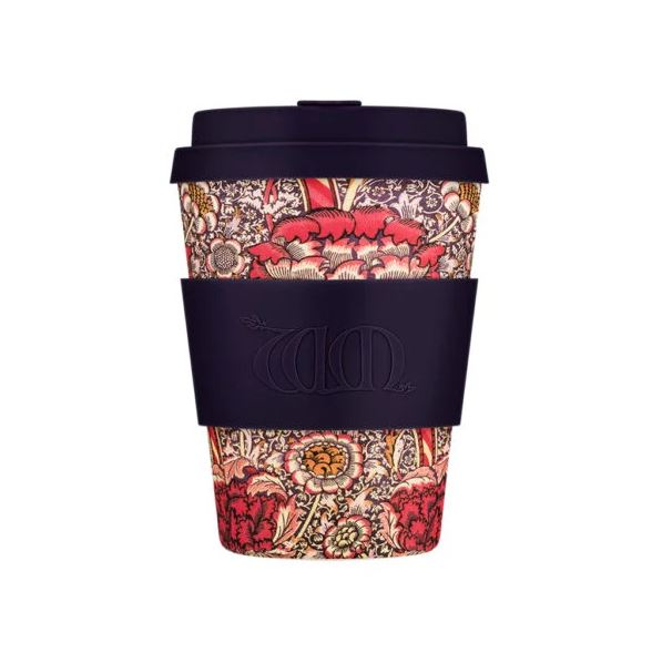 Reusable coffee cup with floral pattern and black lid on a white background