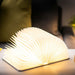 large gingko smart book desk light with natural leather effect finish, open flat and illuminated