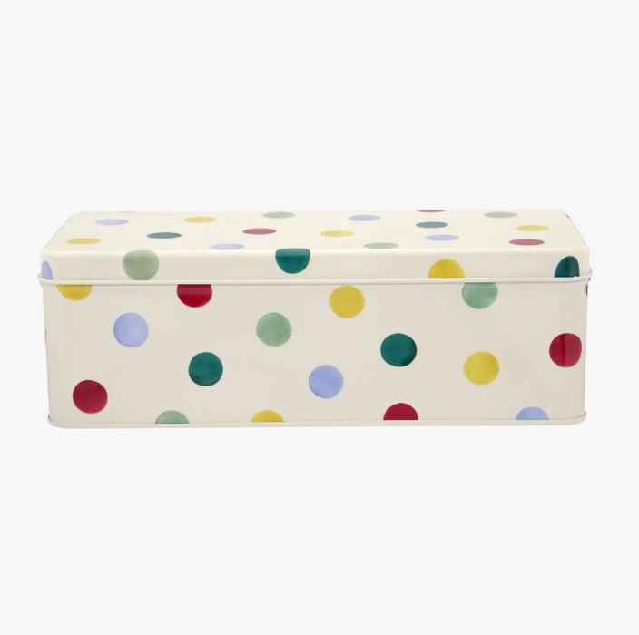 A Cream Rectangle Tin With Yellow, Green, Red and Blue Polka Dots All Over.