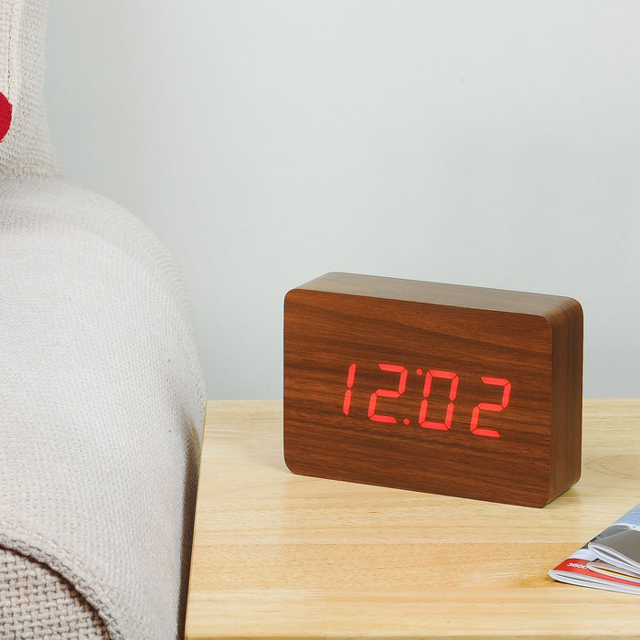 Gingko brick LED click clock in a walnut coloured wooden effect displaying the time in red