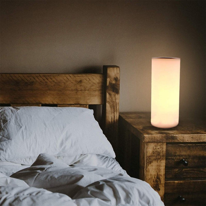 xtralite LED reverse lamp with touch controls illuminated on a bedside cabinet