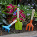 Smart garden range of hand tools being used in a flowerbed.