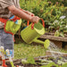 child using smart garden kids green watering can