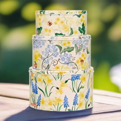 A lovely all-over Spring design, this stacked trio of cake tins sees a cute bumblebee and butterfly nestled in vibrant florals