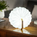  illuminated Gingko smart accordion lamp folded 360 degrees to produce a ball shaped light