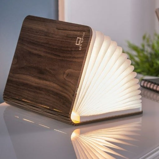large walnut design gingko smart book desk light with natural leather effect finish, open and illuminated