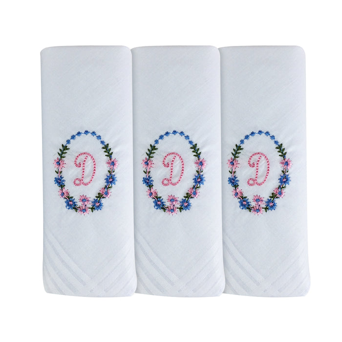 Three pack of white handkerchiefs displaying an embroidered letter D in pink with a floral boarder around the letter.