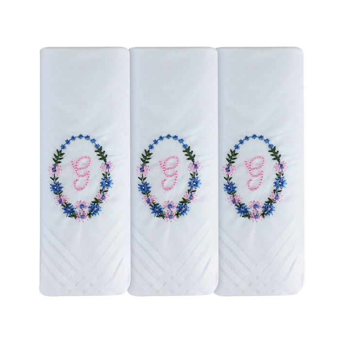 Three pack of white handkerchiefs displaying an embroidered letter G in pink with a floral boarder around the letter.