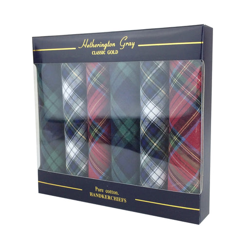 Set of 6 rolled up handkerchiefs presented in a gift box. Each handkerchief has a tartan printed pattern on them. 