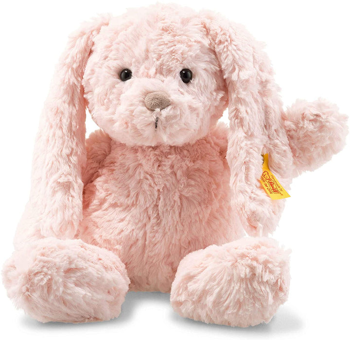 Light pink plush Bunny rabbit with a light brown nose and a Steiff tag attached to the ear 