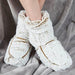 warmies heat-up slipper boots in beige being worn