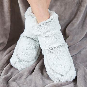 warmies heat-up slipper boots in grey being worn