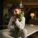 Little boy cuddling his Warmies Alligator. 