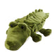 A green coloured Warmies Alligator soft toy, with a cream tummy and black eyes. 