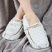 warmies heat-up soft slippers in beige marshmallow being worn