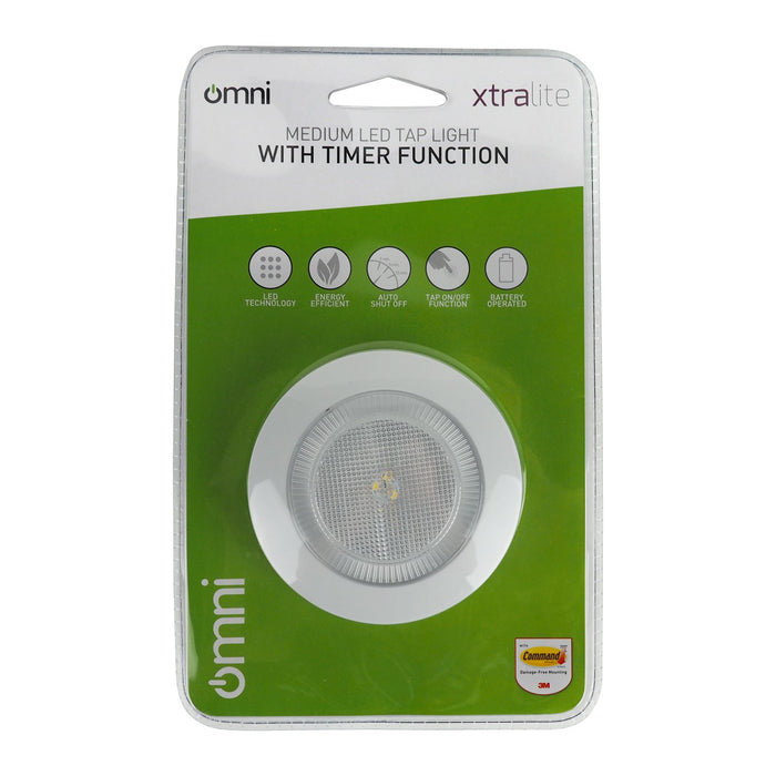 Omni Medium Tap light in green and white outer packaging