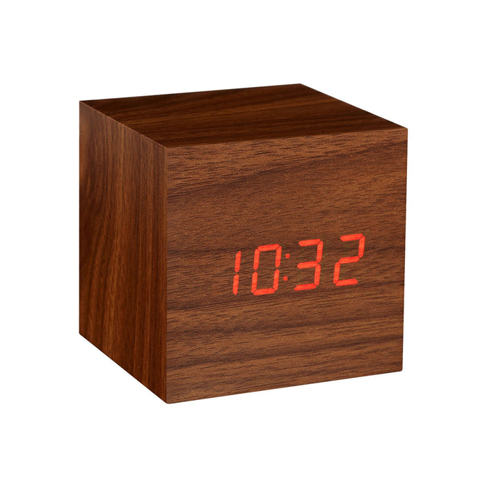 Gingko Cube LED click clock in a walnut effect displaying the time in red
