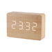 Gingko brick LED click clock in a beech coloured wooden effect displaying the time in white