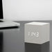 Gingko Cube LED Click Clock in a white wooden effect displaying the time in white
